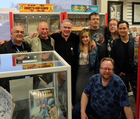 Group shot of some of the attendees, Richard Comely is hidden kneeling behind the small display case.