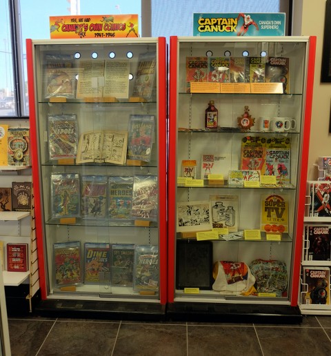 The WECA display case and the Captain Canuck display case together